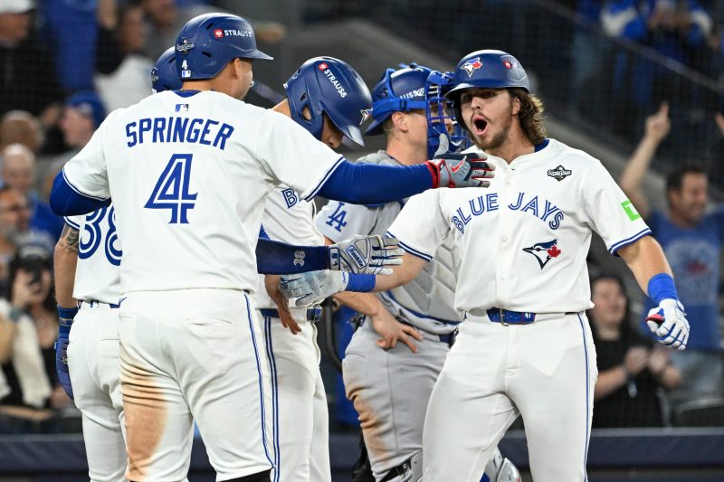 TORONTO – Addison Barger made World Series history, sent Rogers Centre into bedlam and probably buried the Los Angeles Dodgers in Game 1. 
Barger greeted lefty reliever Anthony Banda with a 413-foot shot to right center field, the first pinch-hit grand slam in World Series history and give the Toronto Blue Jays an 11-2 lead as they batted around in the sixth inning. 
Barger has been a postseason hero this October in Toronto but he started Game 1 on the bench with lefty ace Blake Snell starting for the Dodgers. But Snell, who entered with a 0.86 ERA this postseason, did not record an out in the sixth and then the Blue Jays feasted on Dodgers relief. 
Barger’s grand slam was followed by a Vladimir Guerrero Jr. single, shifting Banda into ‘wear it’ mode as the Dodgers look to Game 2.
And then Alejandro Kirk skied a fly to left field that edged over the wall, a two-run homer and the fourth time he reached base in Game 1. 
The Blue Jays’ nine-run sixth was the third-highest scoring inning in World Series history. 
This post appeared first on USA TODAY Watch: Dramatic grand slam breaks open World Series Game 1