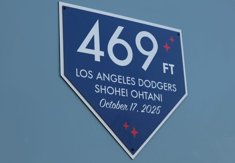 Not only did Shohei Ohtani put up legendary performance in Game 4 of the National League Championship Series, but he also joined some Dodger Stadium history.
The second of his three home run performance was a moonshot that went 469 feet and out of Dodger Stadium, reportedly ending up in bushes behind of the outfield seats.
With a home run that cleared the roof of the outfield pavilion, Ohtani’s home run got recognized with a special plaque at Dodger Stadium before Game 3 of the 2025 World Series against the Toronto Blue Jays.
Dodger Stadium home run plaques
The Dodgers commemorate every home run that clears the roof of the outfield seats, no matter the player or team that did it.
In fact, Ohtani was the second person to get a plaque in the 2025 postseason after Philadelphia Phillies slugger Kyle Schwarber hit one out of the stadium during the National League Divisional Series.
Now, there are eight plaques at Dodger Stadium honoring those who hit them out of the park. Those players are:
Willie Stargell – Pittsburgh Pirates, 1969
Willie Stargell – Pittsburgh Pirates, 1969
Mike Piazza – Los Angeles Dodgers, 1997
Mark McGwire – St. Louis Cardinals, 1999
Giancarlo Stanton – Miami Marlins, 2015
Fernando Tatis Jr. – San Diego Padres, 2021
Kyle Schwarber – Philadelphia Phillies, 2025
Shohei Ohtani – Los Angeles Dodgers, 2025
This post appeared first on USA TODAY Dodger Stadium put up a plaque for a Shohei Ohtani home run. Here’s why.